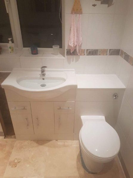 Bathroom vanity and toilet suite installed by JC Plumbing