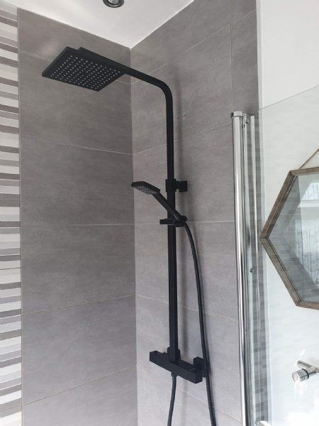 Black shower installation by JC Plumbing